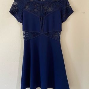 Blue dress with lace detail cutouts